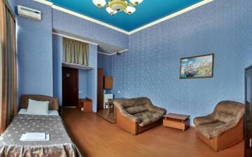Фото номера Стандартный семейный номер Гостиница Экодом Янаис г. Адлер 10