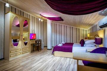 Фото номера Семейный мансардный номер Гостевой дом Galla Hotel г. Адлер 7