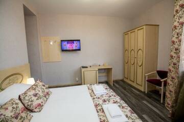 Фото номера Стандарт двухместный с балконом Гостевой дом Galla Hotel г. Адлер 4