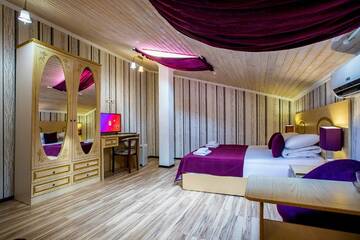 Фото номера Номер стандарт семейный (мансарда) Гостевой дом Galla Hotel г. Адлер 3