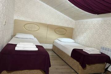 Фото номера Семейный мансардный номер Гостевой дом Galla Hotel г. Адлер 6