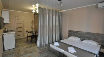 Фото номера Улучшенный номер - студио Гостиница Color Olympics Guest House г. Адлер 4