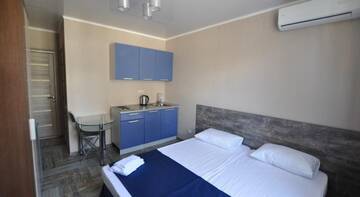 Фото номера Номер-студио (для 2 взрослых) Гостиница Color Olympics Guest House г. Адлер 6