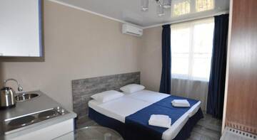 Фото номера Номер-студио (для 2 взрослых) Гостиница Color Olympics Guest House г. Адлер 5