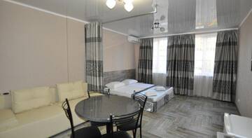 Фото номера Улучшенный номер - студио Гостиница Color Olympics Guest House г. Адлер 2
