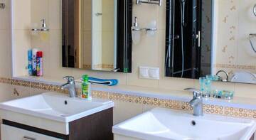 Фото номера Коттедж Апартаменты Apartment in Orhideya Park г. Адлер 12