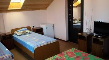 Фото номера Четырехместный номер Делюкс Гостиница Guest House Na Norodnoy г. Адлер 4