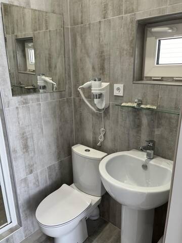 Фото номера Двухместный номер с балконом Гостевой дом Guesthouse Zvezda г. Адлер 3
