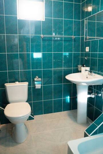 Фото номера Стандартный трехместный номер Гостевой дом Guesthouse Zvezda г. Адлер 8