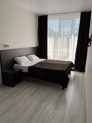 Фото номера Двухместный номер с балконом Гостевой дом Guesthouse Zvezda г. Адлер 2
