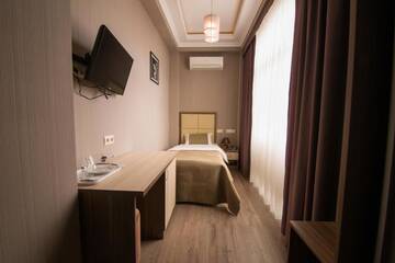 Фото номера Одноместный номер с ванной комнатой Гостиница ML Hotel г. Адлер 6