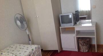 Фото номера Двухместный номер эконом-класса с 2 отдельными кроватями и общей ванной комнатой Гостевой дом Лео-Регул г. Адлер 6