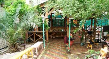 Фото номера Бунгало Делюкс с видом на сад Гостиница Guest House Adler г. Адлер 4