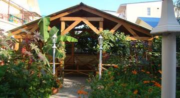 Фото номера Бунгало Делюкс с видом на сад Гостиница Guest House Adler г. Адлер 9