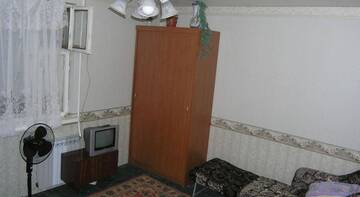 Фото номера Двухместный номер с 2 отдельными кроватями и общей ванной комнатой Гостиница Фиалка г. Адлер 2