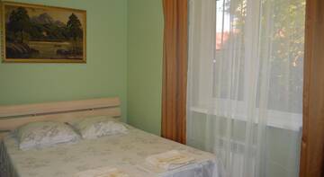 Фото номера Двухместный номер с 2 отдельными кроватями Гостиница Guest House V Olimpiyskoy Derevne г. Адлер 6