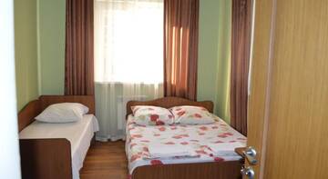 Фото номера Трехместный номер с основными удобствами Гостиница Guest House V Olimpiyskoy Derevne г. Адлер 9