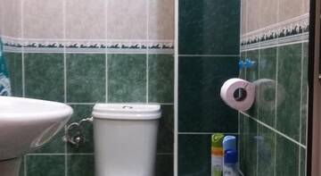 Фото номера Стандартный семейный номер Гостиница Guest House Kirova 42 г. Адлер 7