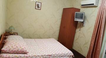 Фото номера Четырехместный номер эконом-класса с общей ванной комнатой Гостиница Ираида г. Адлер 2