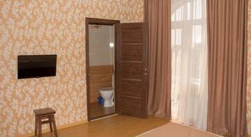 Фото номера Двухместный номер с 1 двуспальной кроватью и дополнительной кроватью Гостиница Guest House Кameta г. Адлер 9