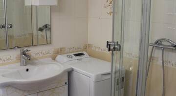 Фото номера Апартаменты с 2 спальнями Гостевой дом Guest House Ksenia г. Адлер 10
