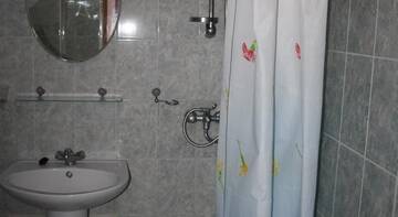 Фото номера Двухместный номер с 2 отдельными кроватями Гостевой дом Каскад г. Адлер 5
