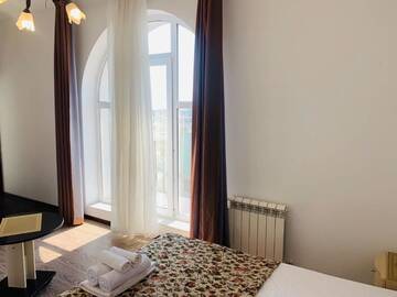 Фото номера Стандартный двухместный номер с 1 кроватью Гостиница Папайя г. Адлер 5
