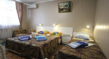 Фото номера Стандартный трехместный номер Гостиница  Adler Home г. Адлер 2