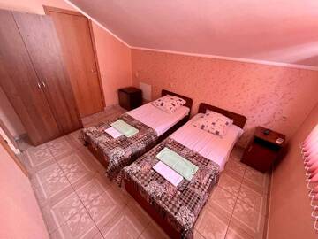 Фото номера Стандартный двухместный номер с 1 кроватью и балконом Гостевой дом Симфония г. Адлер 7