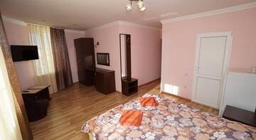 Фото номера Стандартный двухместный номер с 1 кроватью или 2 отдельными кроватями и балконом Гостиница Guest house Na Figurnoy 51 г. Адлер 7