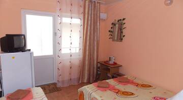 Фото номера Трехместный номер -люкс Гостиница Guest House Omichka г. Адлер 2