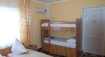 Фото номера Четырехместный номер Гостиница Guest House Omichka г. Адлер 8