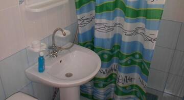 Фото номера Четырехместный номер Гостиница Guest House Omichka г. Адлер 5