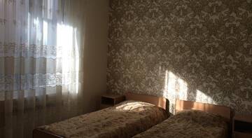 Фото номера Двухместный номер с 2 отдельными кроватями и общей ванной комнатой Гостиница Гостевой дом «Анита» г. Адлер 5