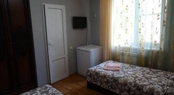 Фото номера Двухместный номер с 2 отдельными кроватями Гостиница Лукоморье г. Адлер 3
