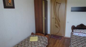 Фото номера Двухместный номер с 2 отдельными кроватями и видом на горы Гостиница Лукоморье г. Адлер 4