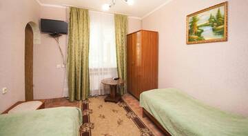 Фото номера Двухместный номер с 1 кроватью или 2 отдельными кроватями Гостевой дом Мини отель Юна г. Адлер 3