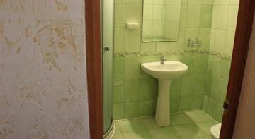 Фото номера Стандартный двухместный номер с 1 кроватью или 2 отдельными кроватями Гостиница Гостевой дом Олива г. Адлер 4