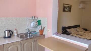 Фото номера Трехместный номер Гостиница Mini Hotel na Pikhtovom г. Адлер 4
