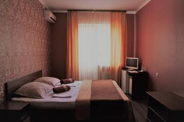 Фото номера Большой двухместный номер c 1 кроватью или 2 отдельными кроватями Гостевой дом Palma г. Адлер 8