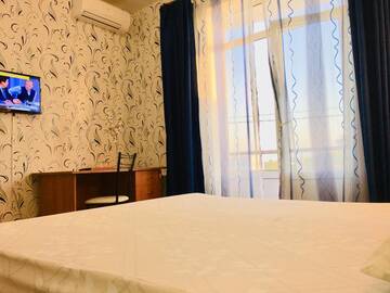 Фото номера Стандартный двухместный номер с 1 кроватью или 2 отдельными кроватями Гостиница Гостевой дом на Войтенко г. Адлер 9